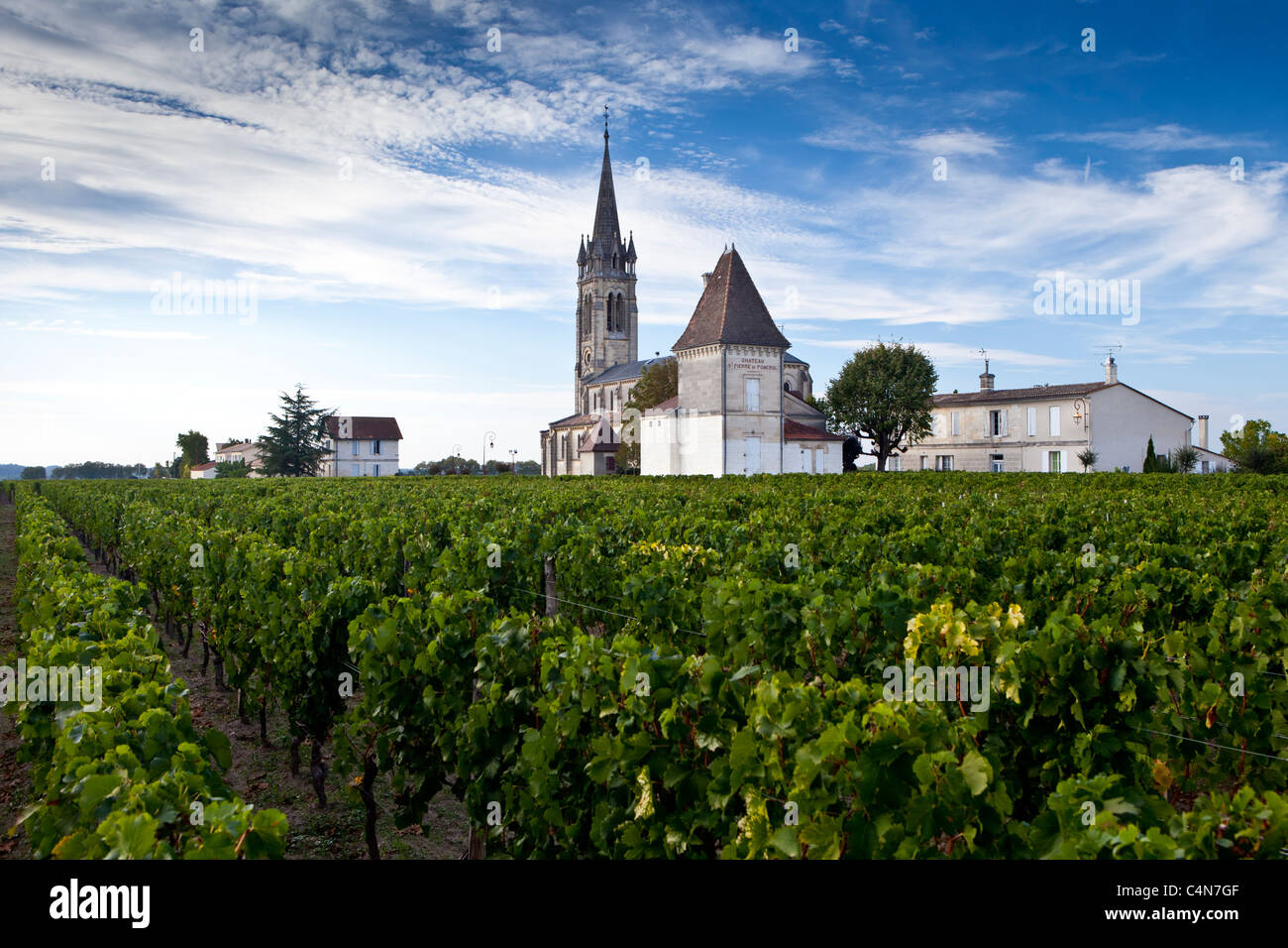 Village of Pomerol with vineyard, Chateau St Pierre and Church of St Jean in the Bordeaux wine region of France Stock Photo