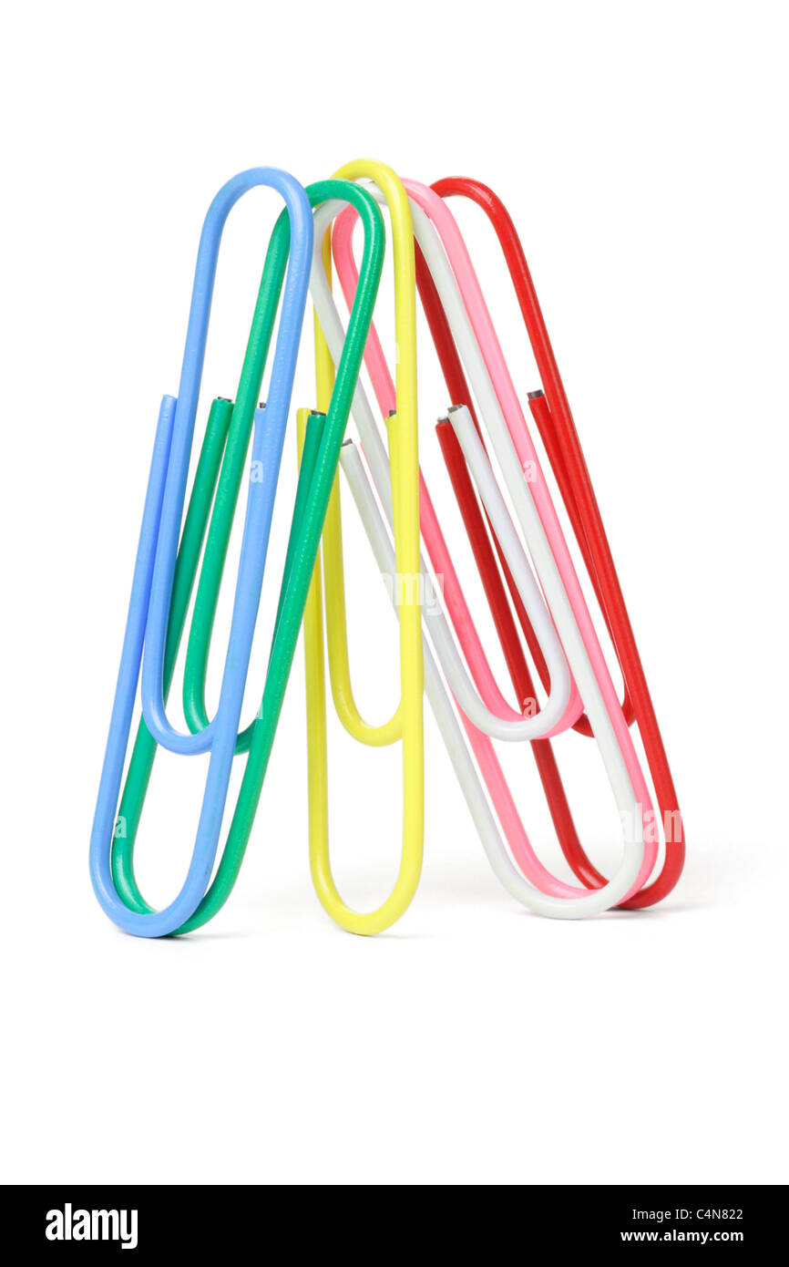 Multicolor paper clips standing on white background Stock Photo