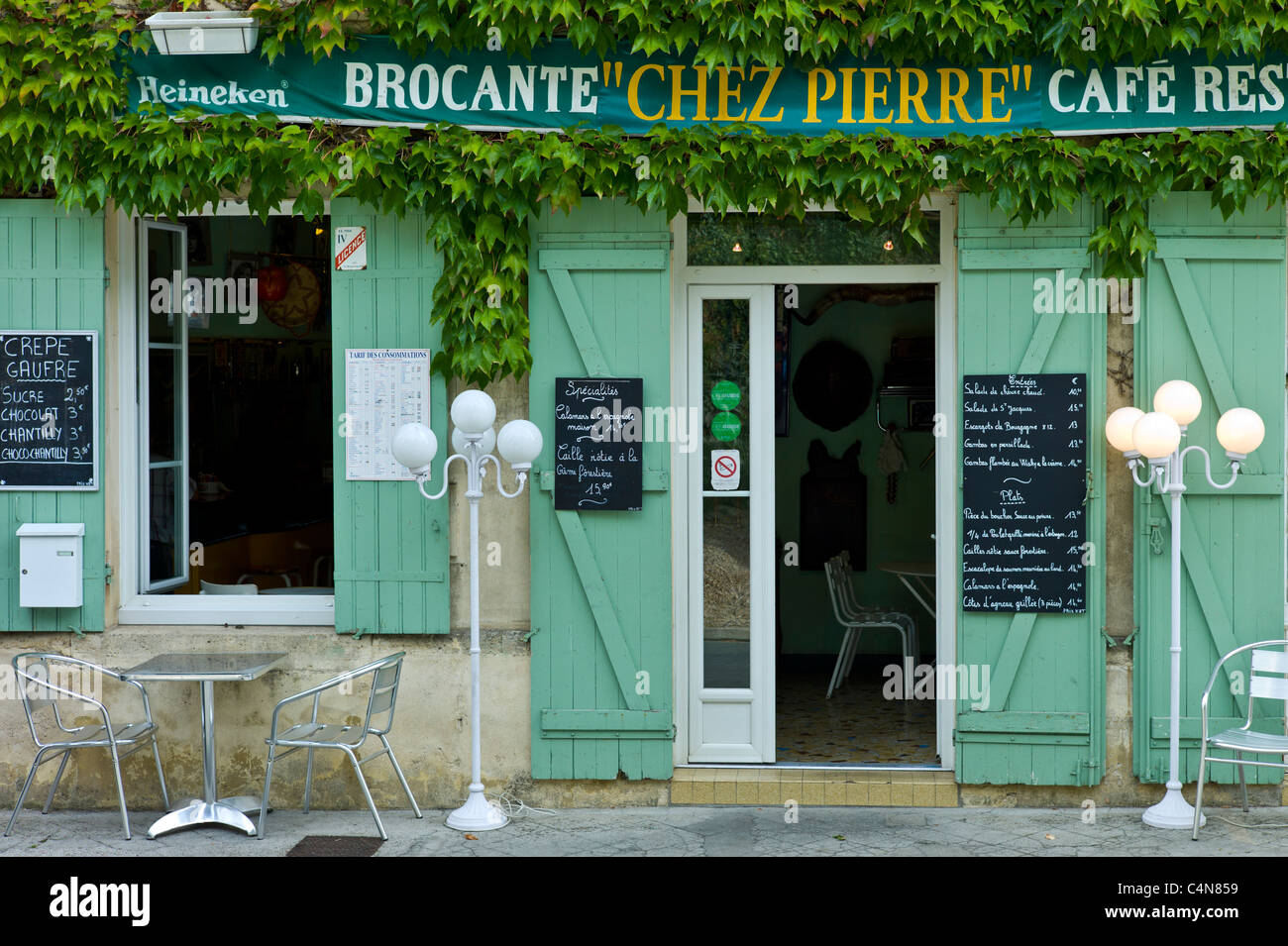 Traditional French Cafe Chez Pierre with menus in town of Castelmoron d'Albret in Bordeaux region, Gironde, France Stock Photo