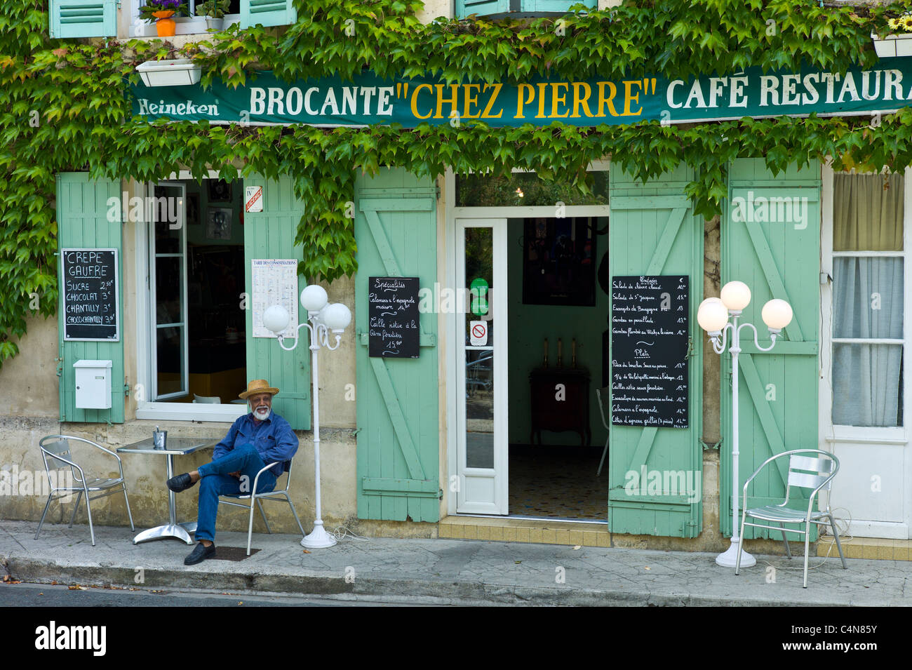 Traditional French Cafe Chez Pierre with menus in town of Castelmoron d'Albret in Bordeaux region, Gironde, France Stock Photo