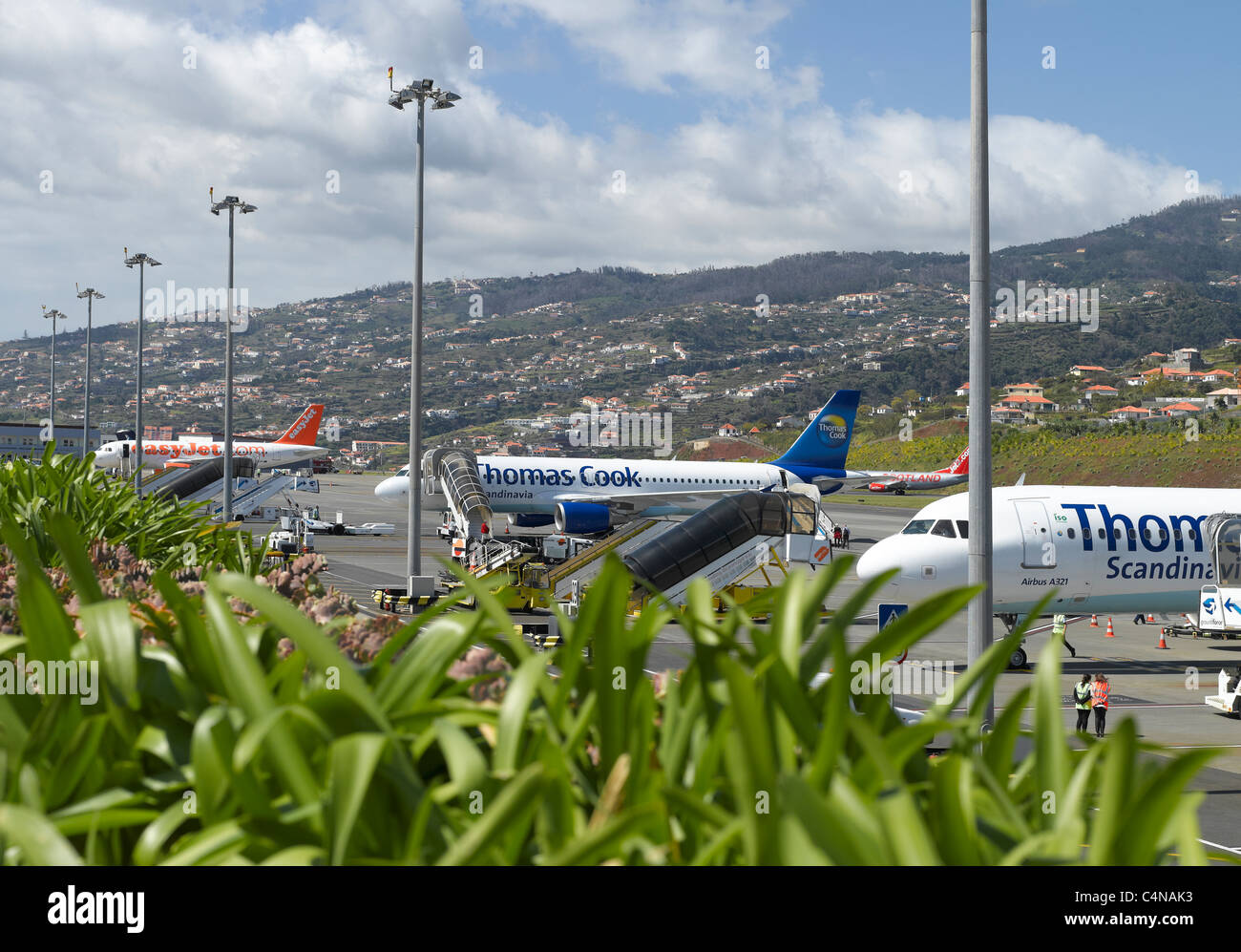 Aircraft plane airplane planes airplanes parked at Funchal airport Madeira Portugal EU Europe Stock Photo