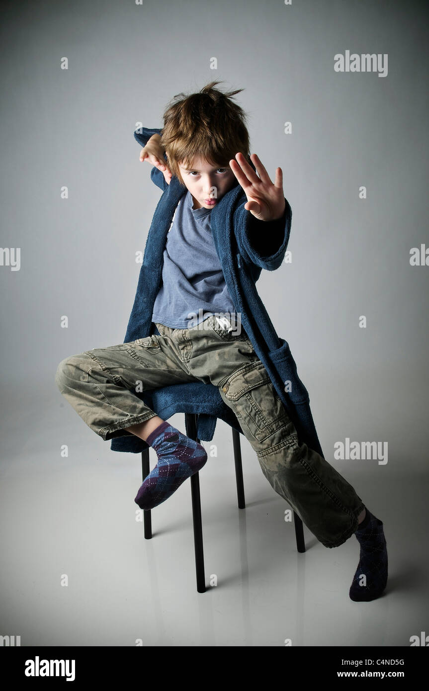 Boy Sitting On Stool High Resolution Stock Photography and Images - Alamy
