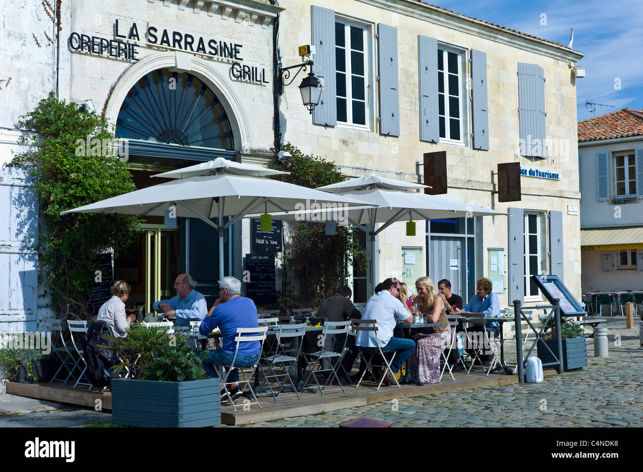 Traditional French street cafe, La Sarrasine Creperie and Grill at St Martin de Re, Ile de Re, France Stock Photo
