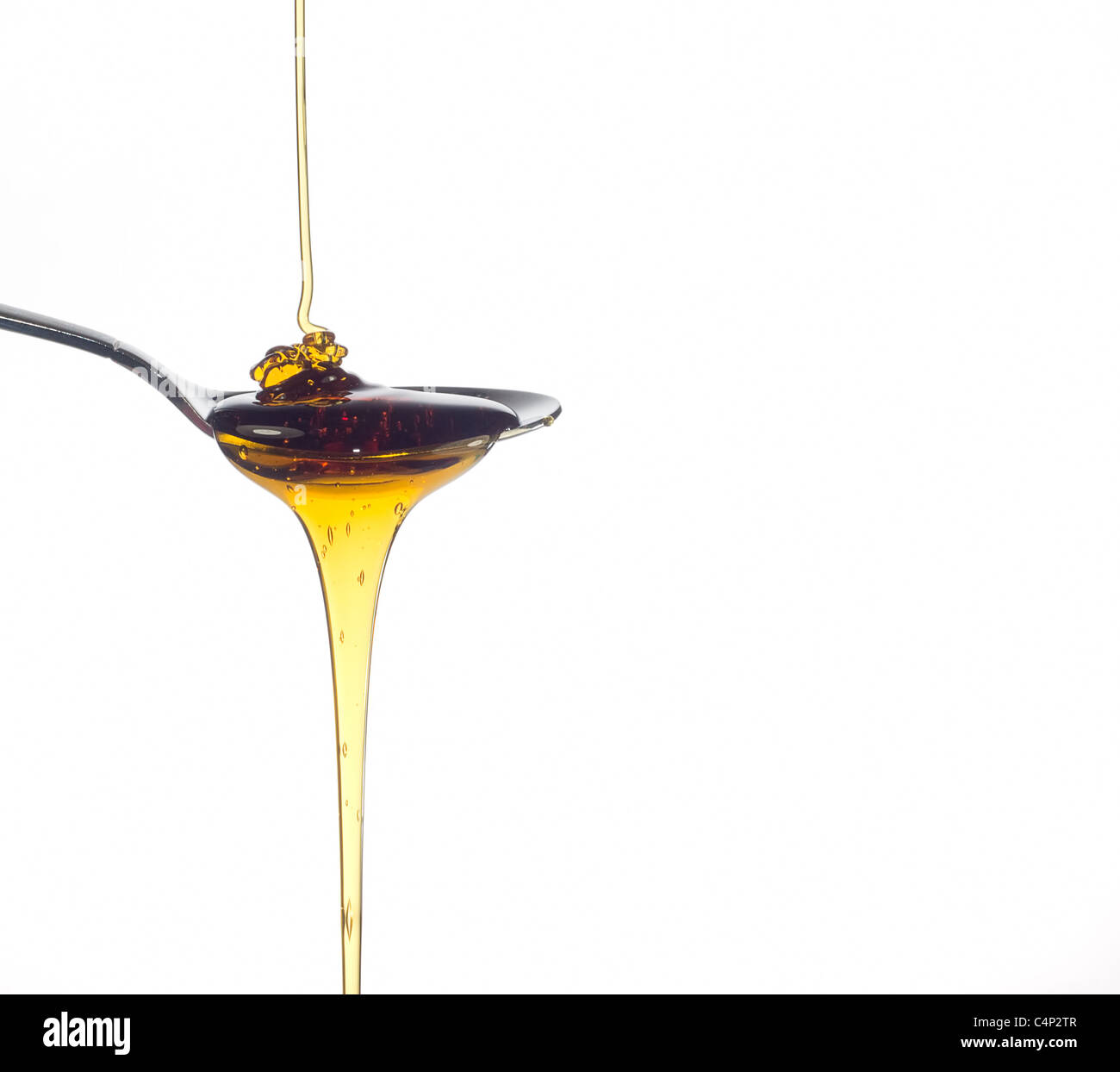 pouring honey Stock Photo