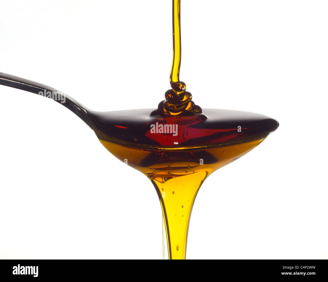 pouring honey Stock Photo
