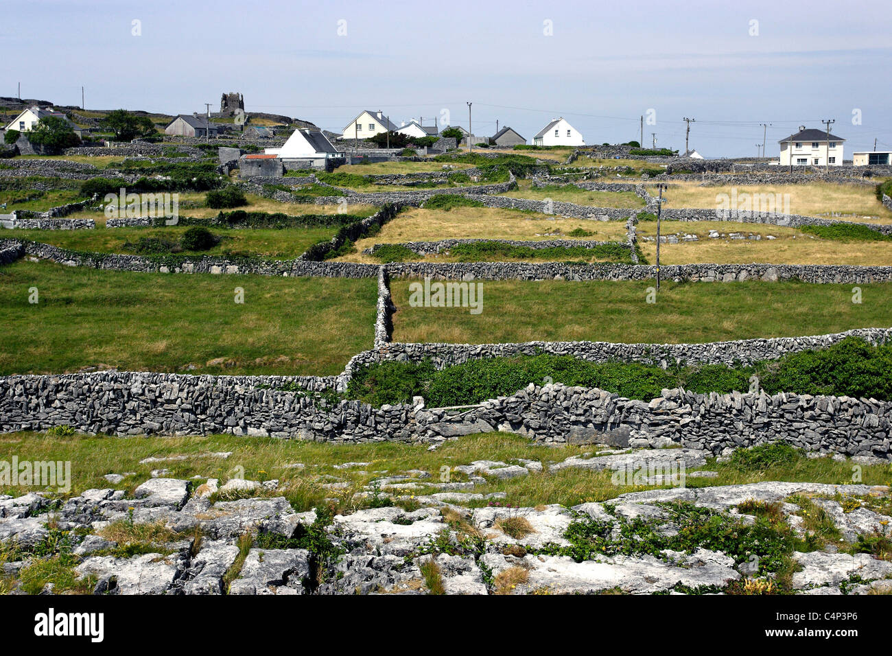Rocky Stone Walls Landscape and Cottages, Inishere Island Ireland Stock Photo