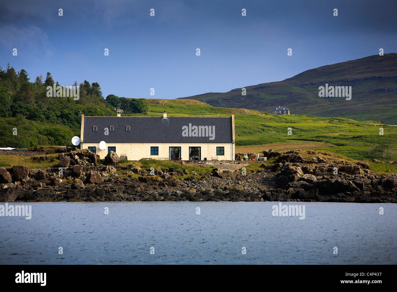 The community building (An Laimhrig) located at the head of the pier , Isle of Eigg, Inner Hebrides. It includes a pub, shop and Stock Photo