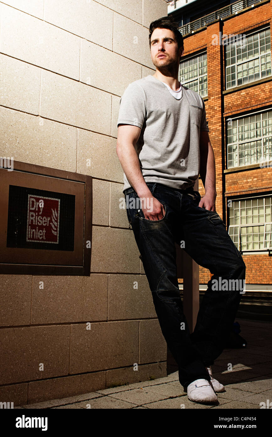 Street fashion shoot with male model Stock Photo - Alamy