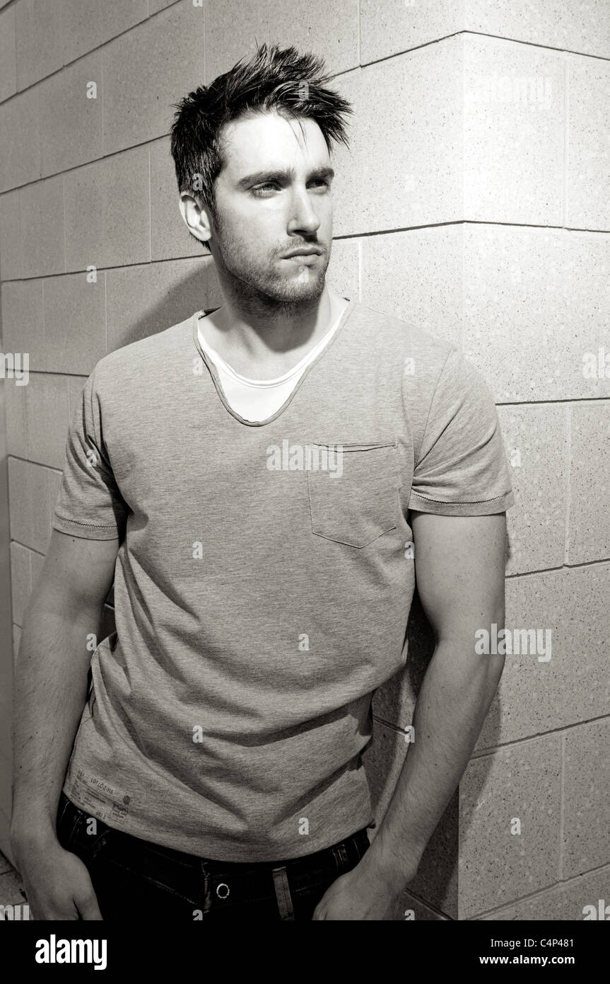 Street fashion shoot with male model Stock Photo - Alamy