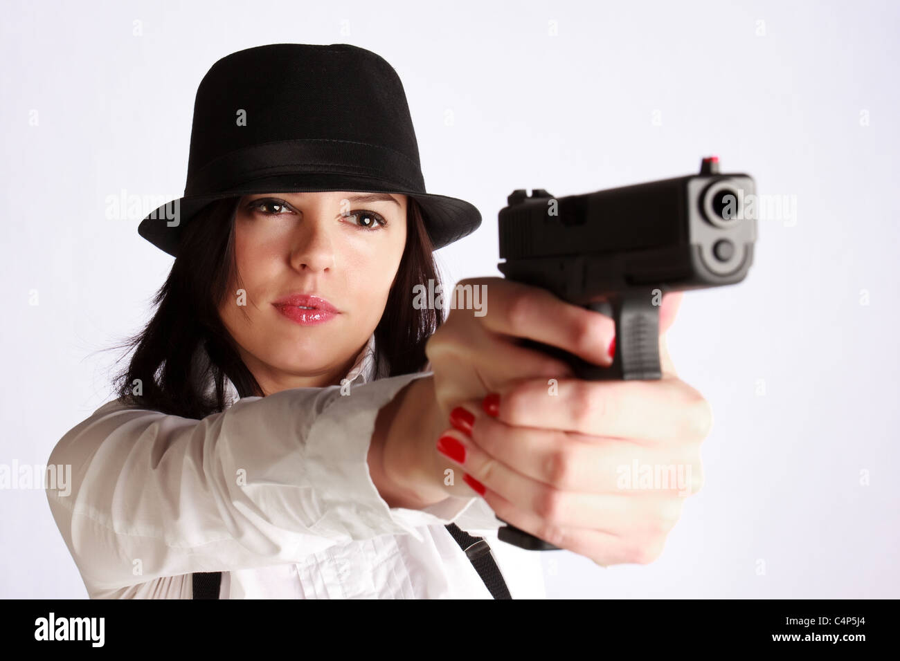 Serious woman aiming gun hi-res stock photography and images - Alamy