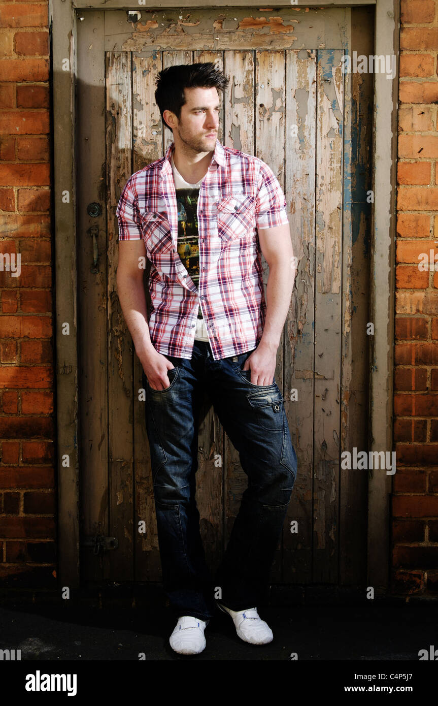 Street fashion shoot with male model Stock Photo - Alamy