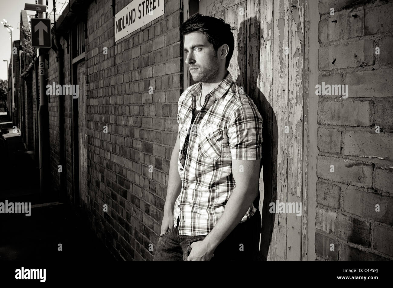 Street fashion shoot with male model Stock Photo - Alamy