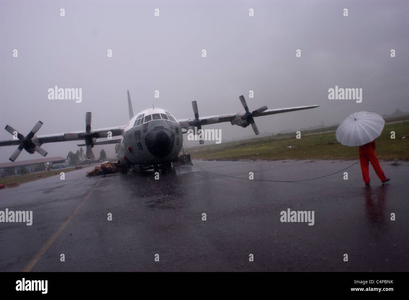 A transport plane bound for Medan, after the tsunami and earthquake, in Banda Aceh, Indonesia Stock Photo