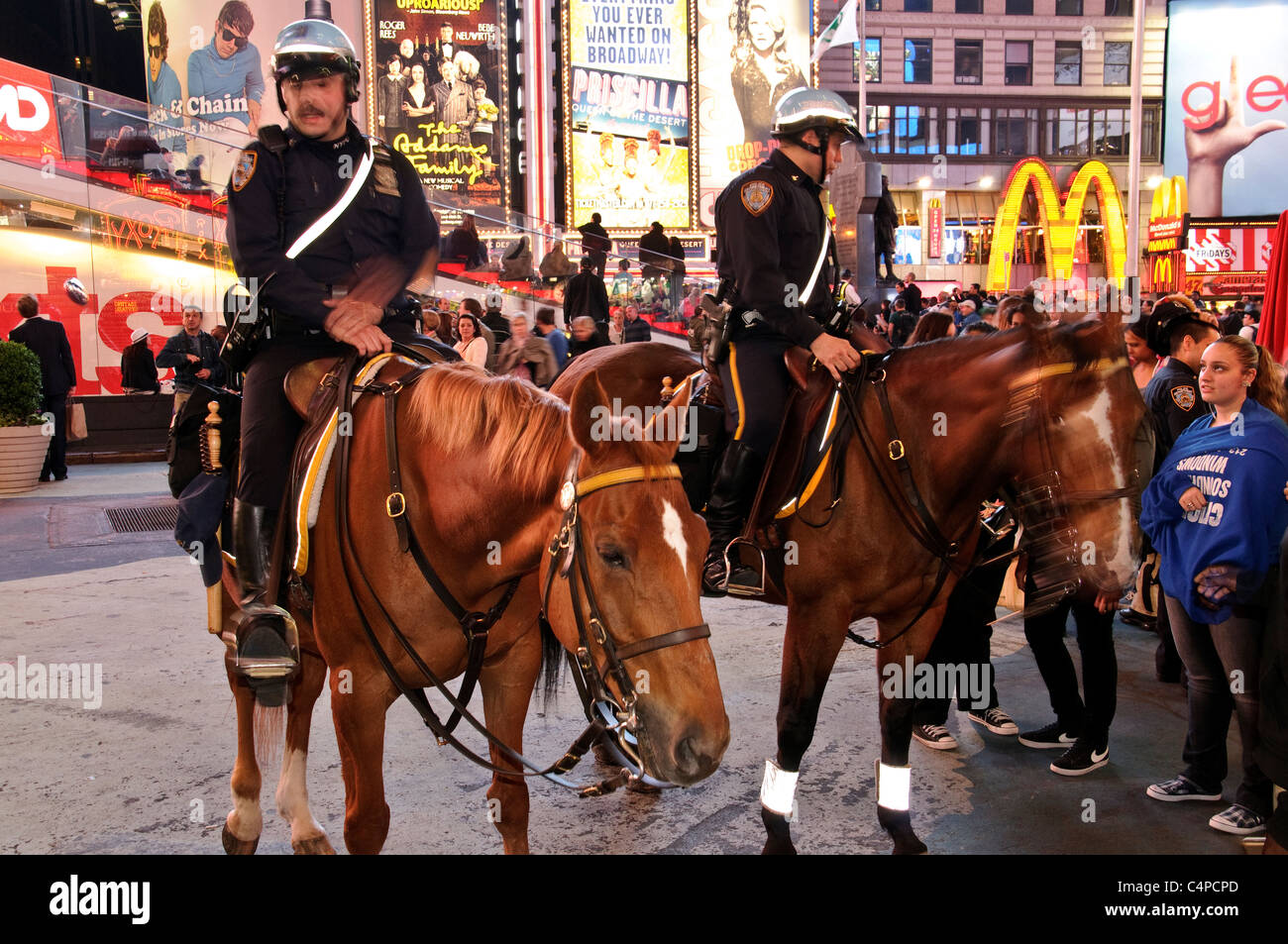 Times Square, 42nd Street, New York City, 2011, NYPD on horseback, a ...