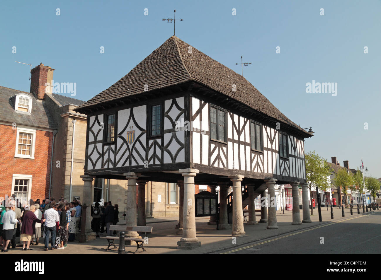 The former Town Hall building dominates the main street in the small Wiltshire village of Royal Wootton Bassett, England, UK. Stock Photo