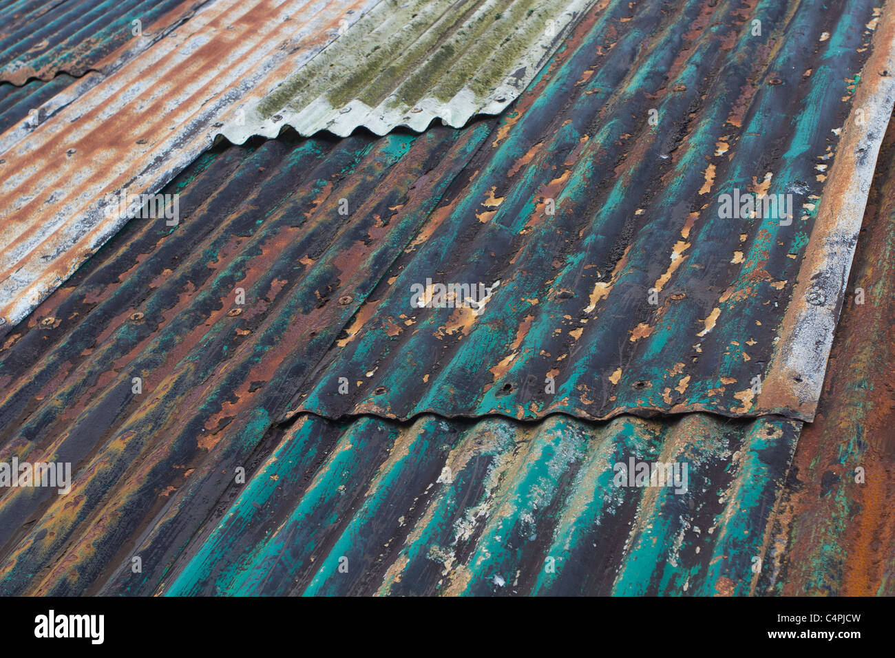 Corrugated iron roof weathered by the sea and sun. Stock Photo