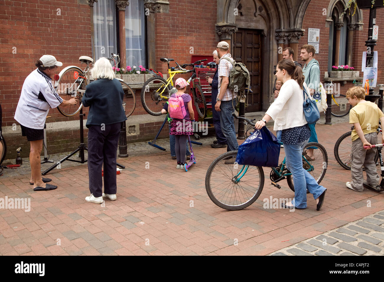 Street bicycle repair service Lewes, East Sussex, England Stock Photo