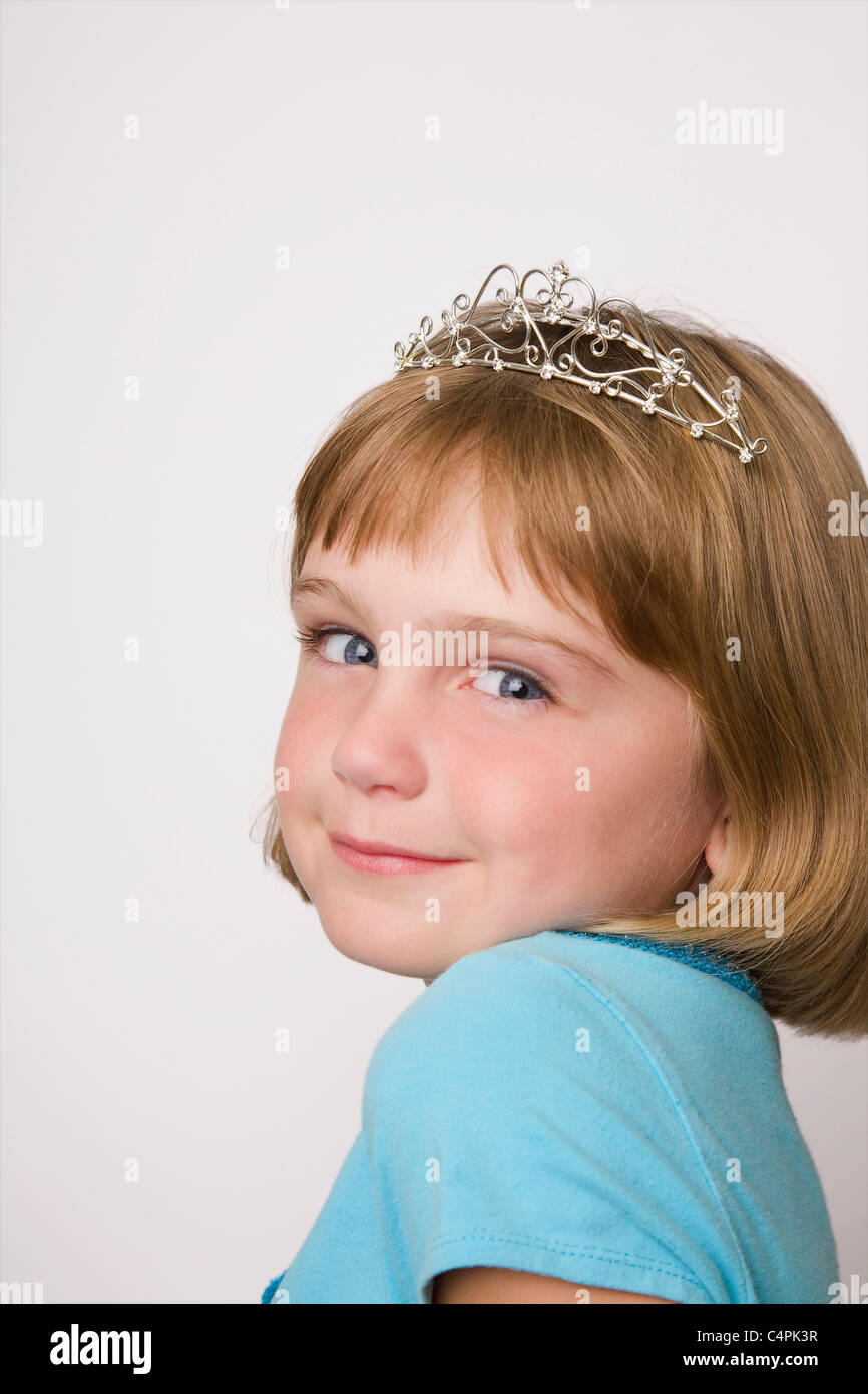 7-yr-old girl wearing tiara Stock Photo