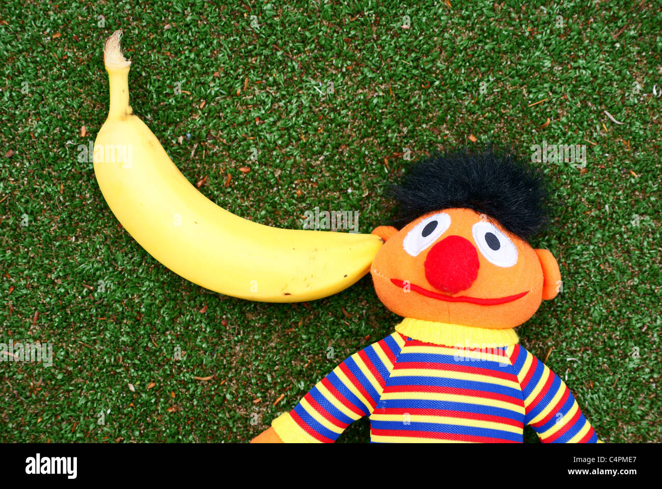 Sesam street, Bert with a banana in his ear. Stock Photo