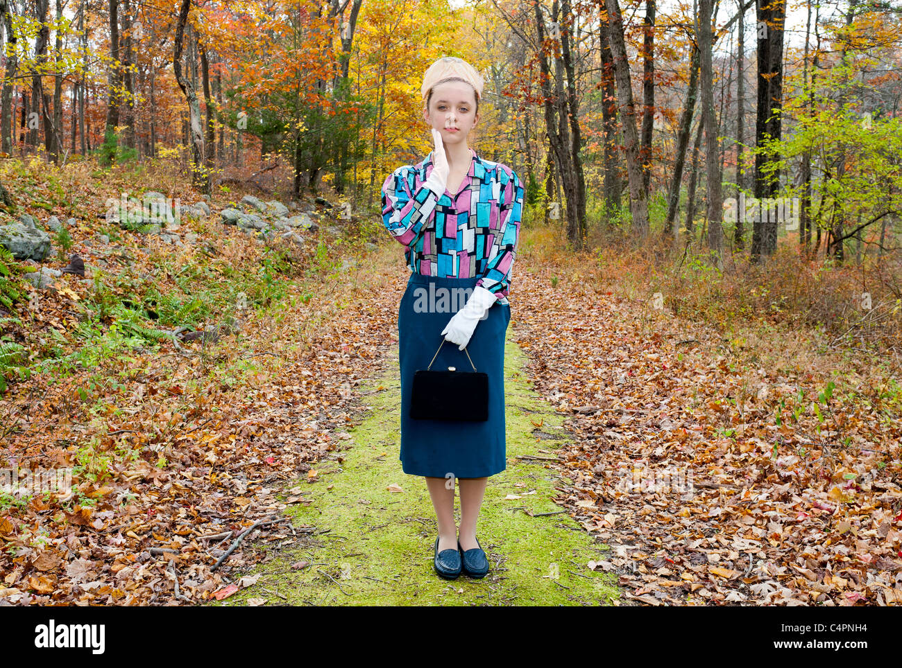 Female teenager dressed as old lady. Stock Photo