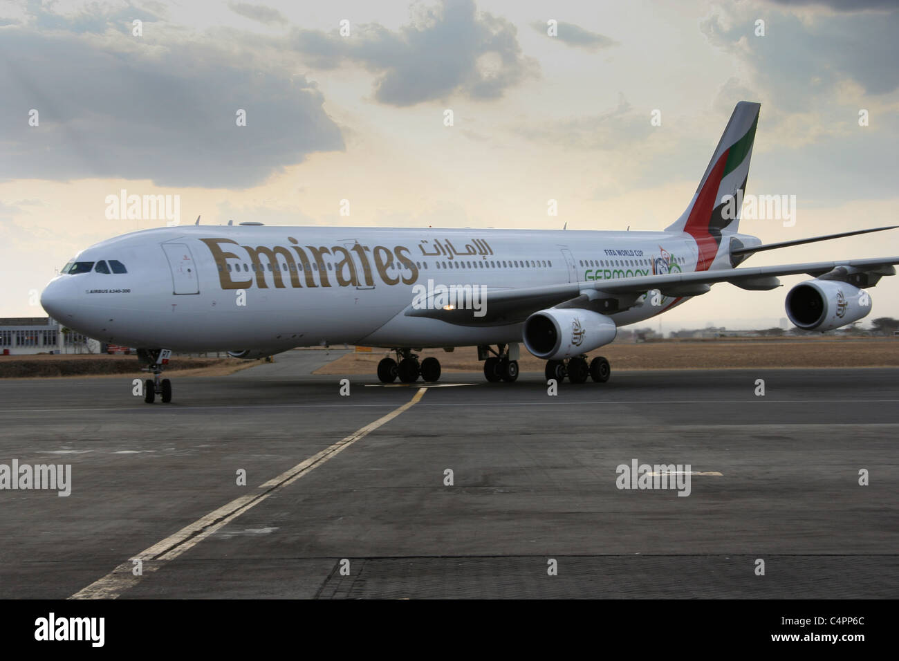 Emirates Airline plane livery logo nairobi airport Stock Photo