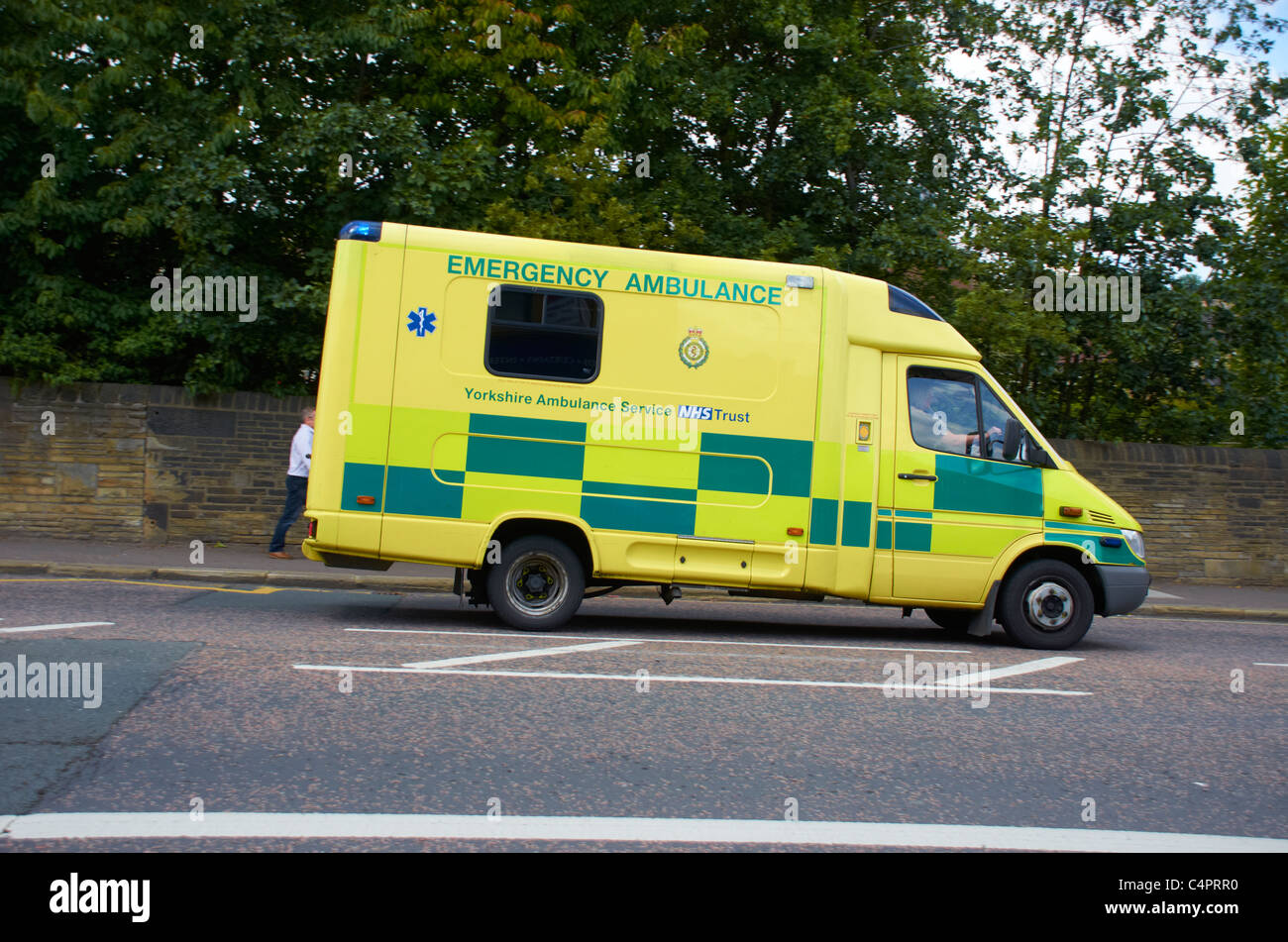 Ambulance attending an emergency in Huddersfield, West Yorkshire. Stock Photo