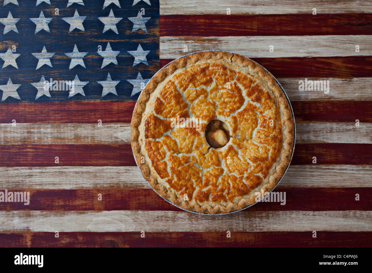 Apple pie on folk art American flag Stock Photo Alamy