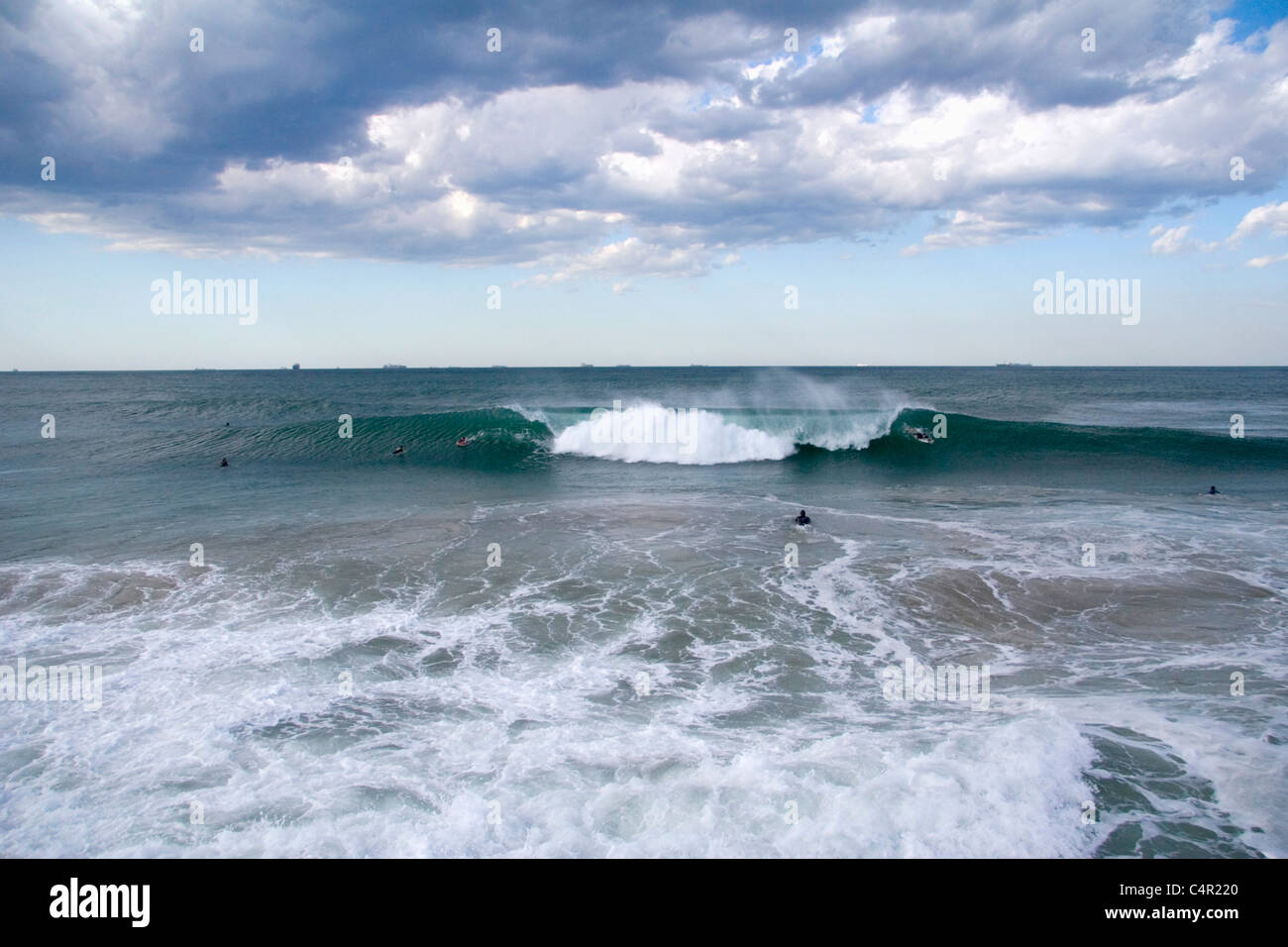 Some epic surf along the Durban pier, Durban, South Africa Stock Photo
