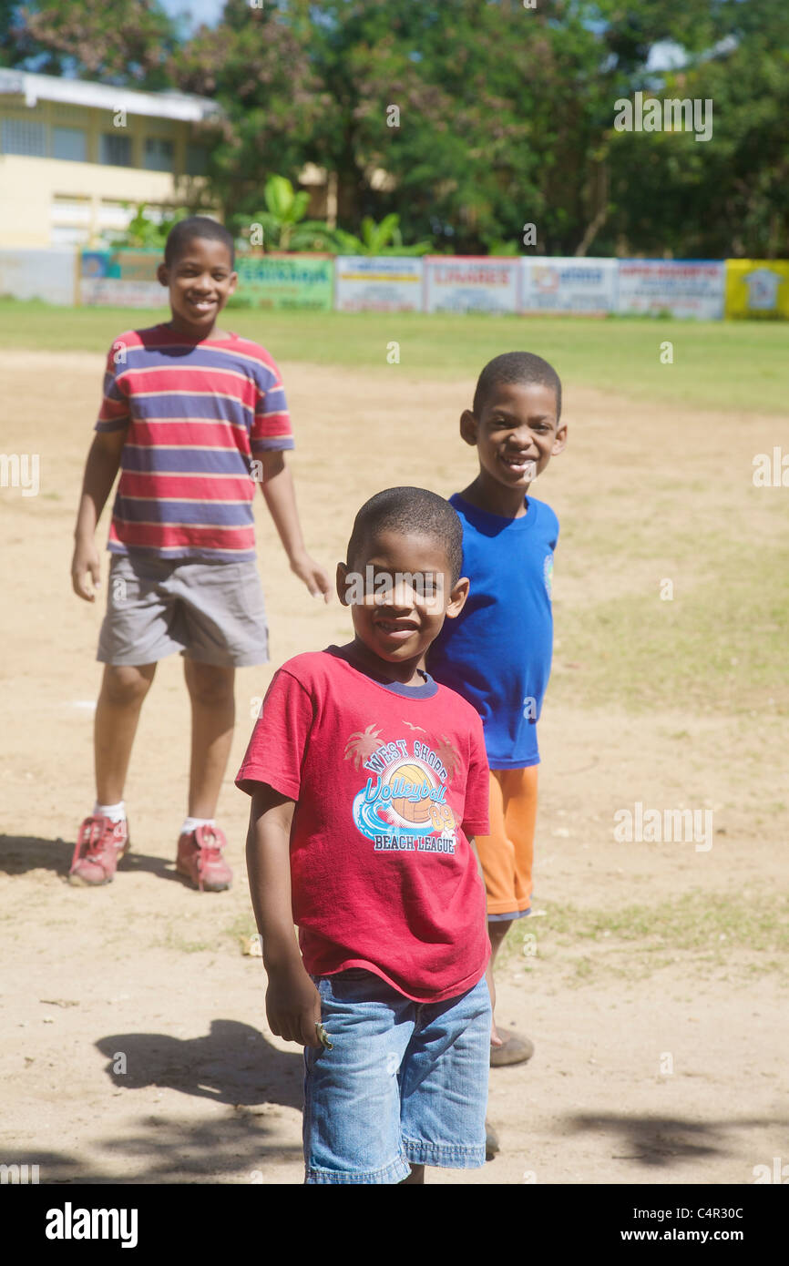 Boys on baseball field, Sosua, Dominican Republic Stock Photo