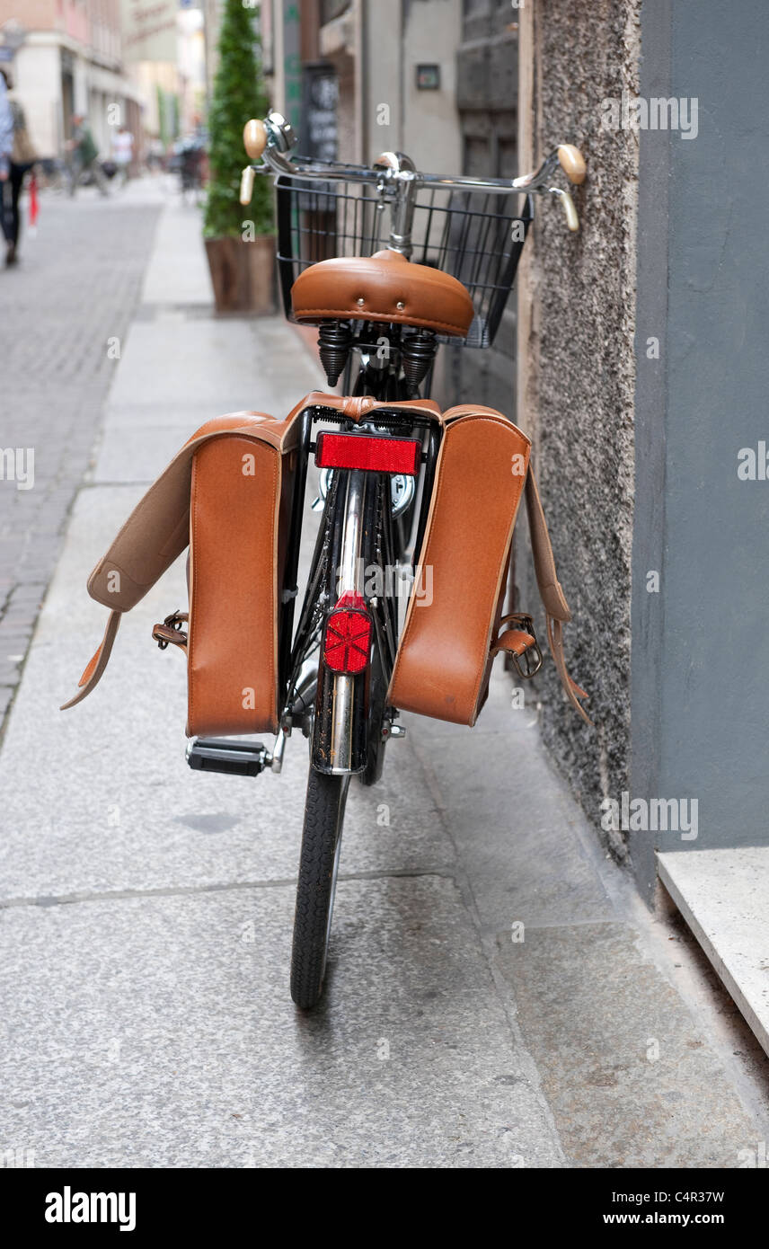 traditional style bicycle with leather saddlebags and seat Stock Photo