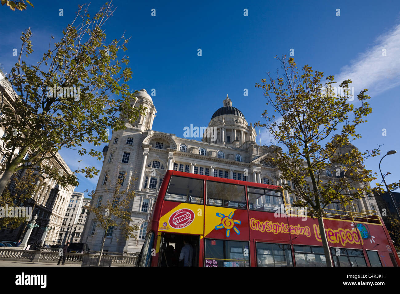 Sightseeing bus outside Port of Liverpool Building, Liverpool, Merseyside, England Stock Photo
