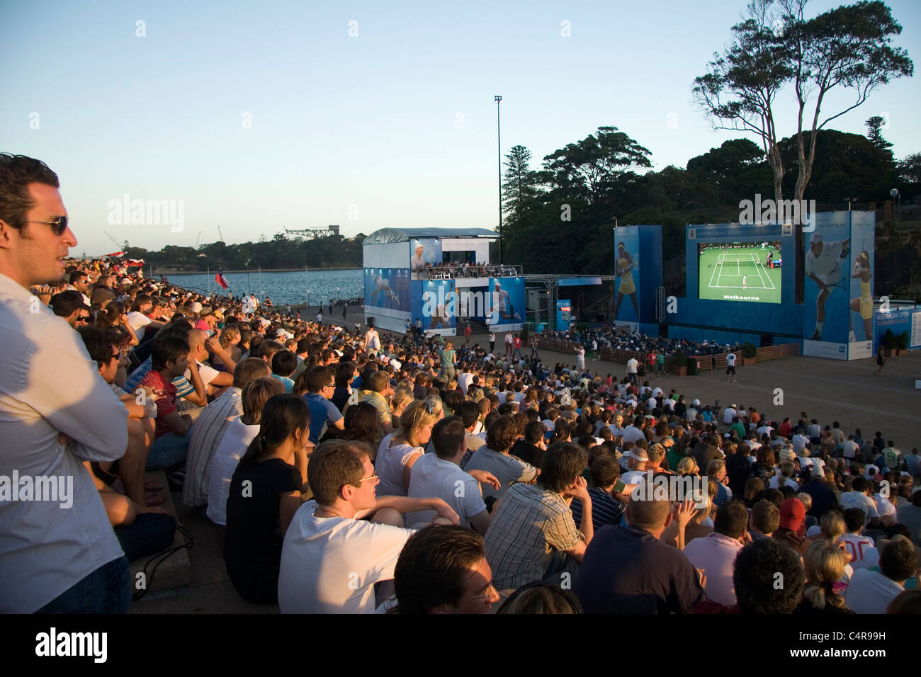 Large crowd outside the Sydney Opera House watching the finals of the Australian Open, Sydney, Australia Stock Photo