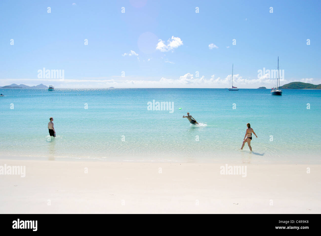 Playing in the ocean, Whitsunday Islands, Airlie Beach, Australia Stock Photo