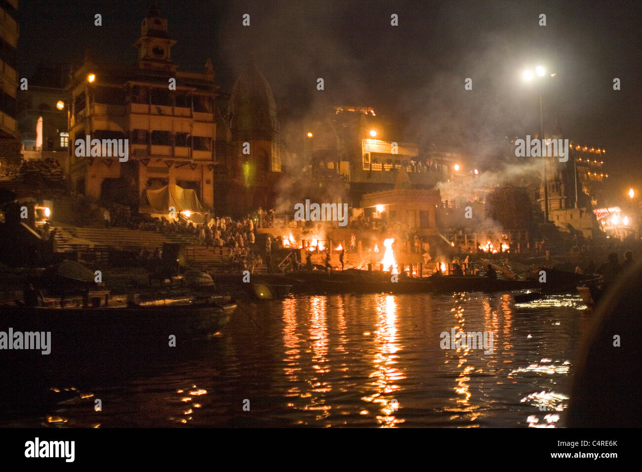 Burning ghat along Ganges River, Varanasi, India Stock Photo
