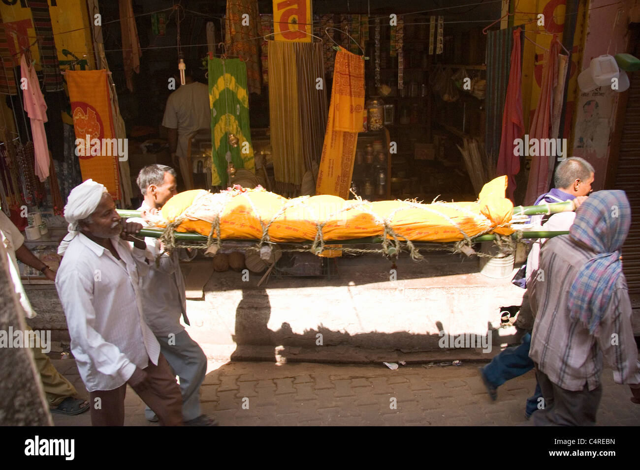 A dead body on its way to the funeral pyre in Varanasi, India Stock