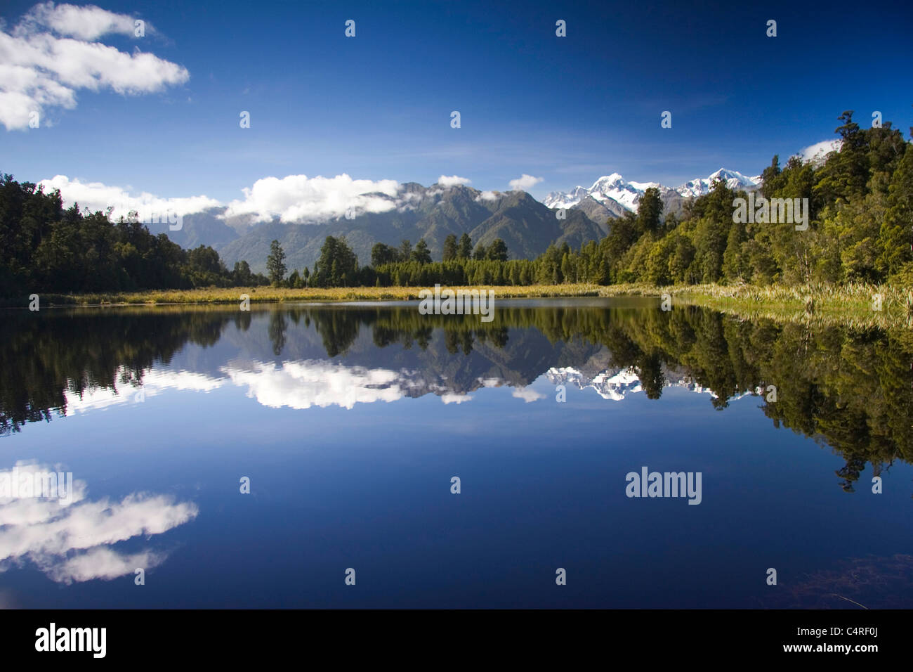 Reflections in Lake Mathesone, South Westland, New Zealand Stock Photo