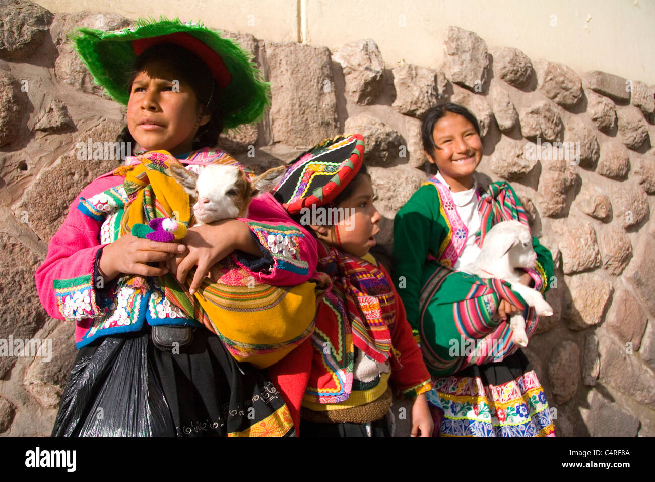 Colorful traditional clothing of local girls, Cusco, Peru, South America Stock Photo