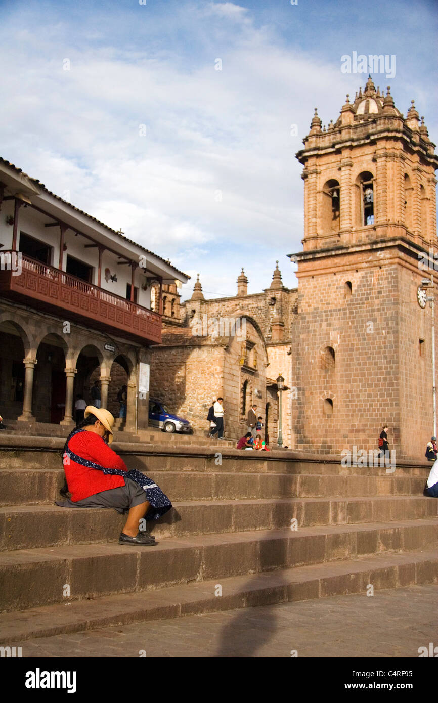 Vendor sitting on steps in Cusco, Peru, South America Stock Photo