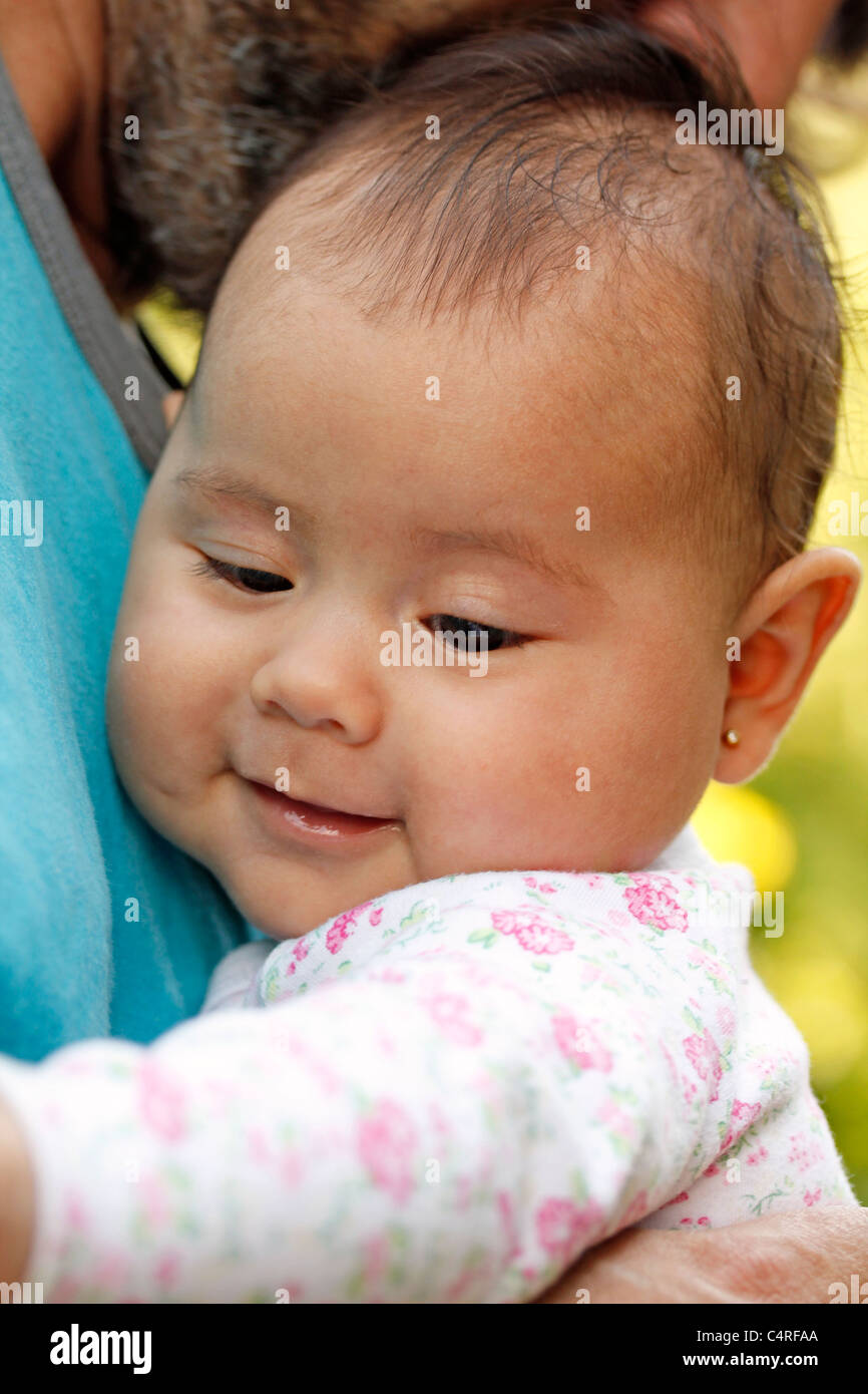 Baby and her father. Stock Photo