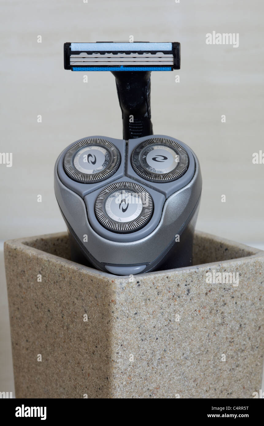 electric and wet razors together in a bathroom Stock Photo Alamy