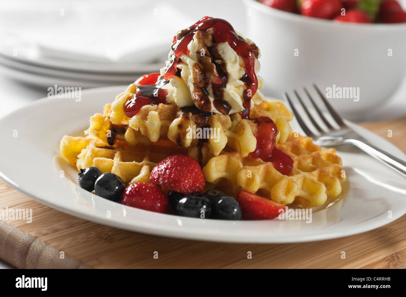 Waffles with fresh fruit and cream Stock Photo - Alamy