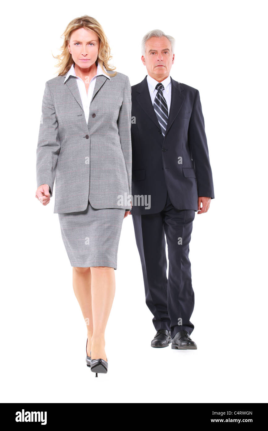 businessman and businesswoman walking Stock Photo - Alamy