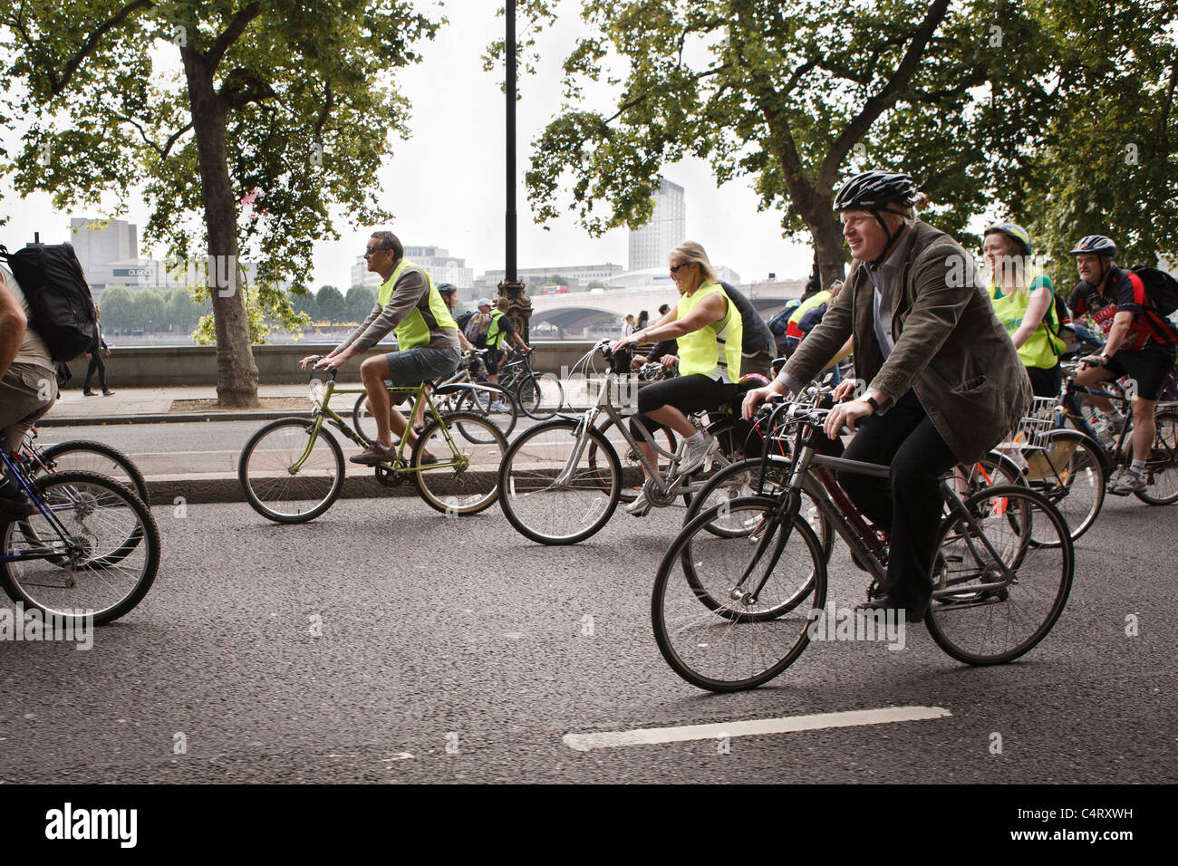 Boris Johnson rides a bicycle through London Stock Photo