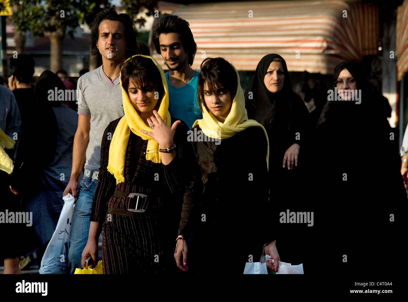 Iranian people crossing the street in Rasht (Iran) Stock Photo