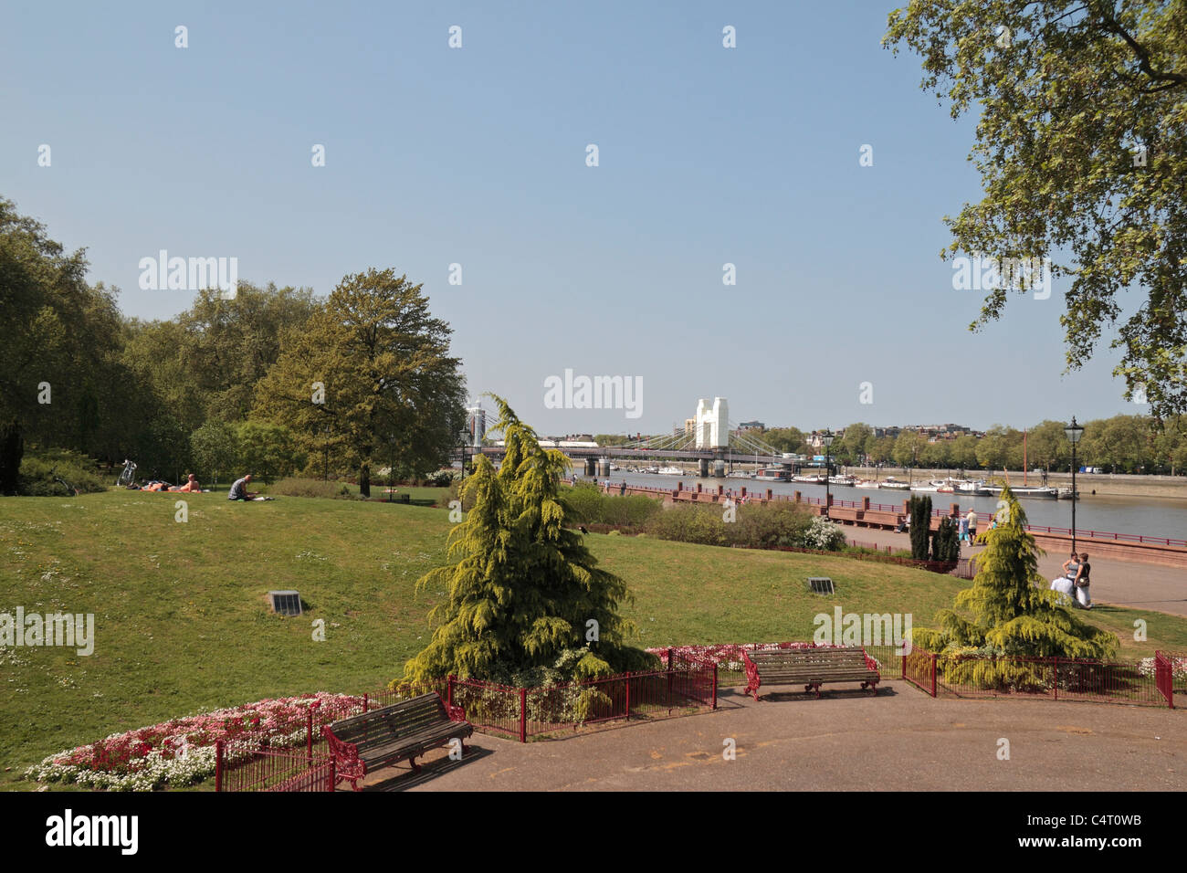 View towards Albert Bridge & the River Thames from the Buddist Peace Pagoda in Battersea Park, London, UK. Stock Photo