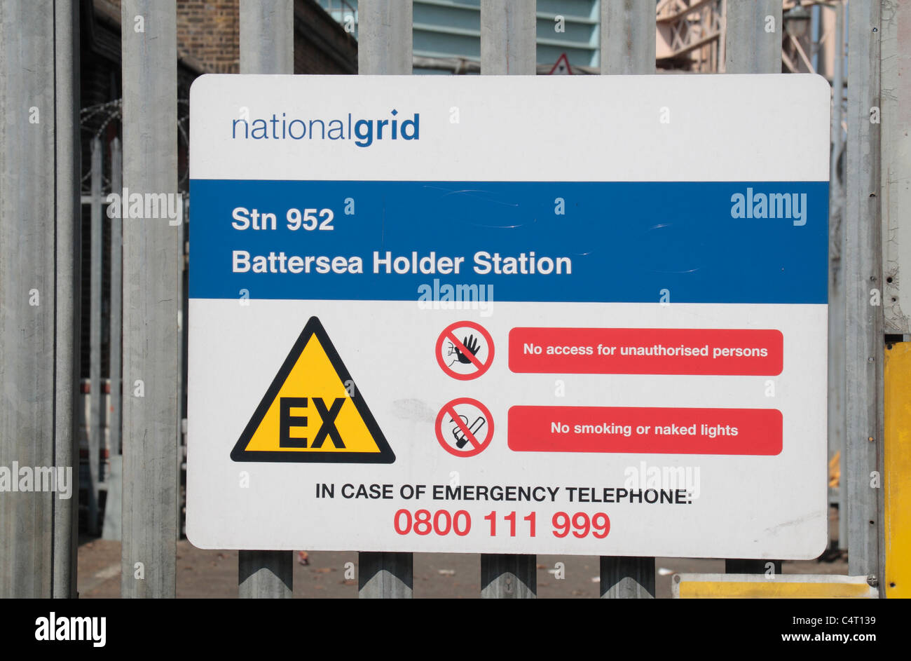 Sign outside the National Grid Battersea Holder Station (gas reserve container), Prince of Wales Drive, Battersea, London. Stock Photo