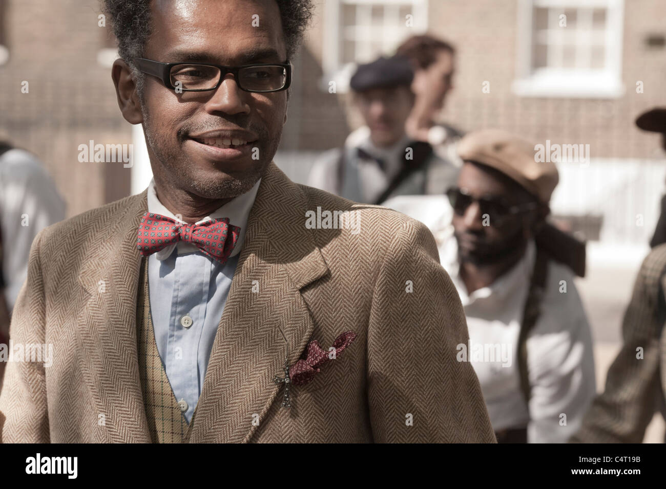 Portrait of a man in a tweed suit and red bowtie at the London Tweed Run,  2011 Stock Photo - Alamy