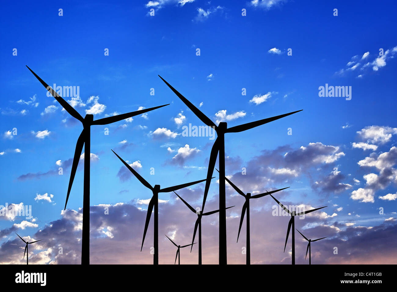 Wind turbines at sunset Stock Photo - Alamy
