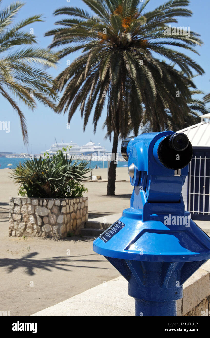 Telescope on the edge of Malagueta beach looking towards the port and Mediterranean sea, Malaga, Spain, Europe. Stock Photo
