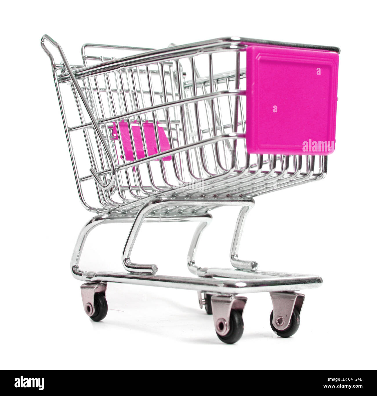 A miniature shopping trolley in studio Stock Photo